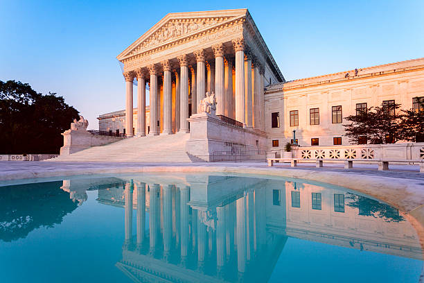 istock US Supreme Court and reflecting pool 506345324