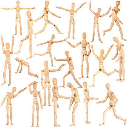 Set of wooden dummies isolated on a white background