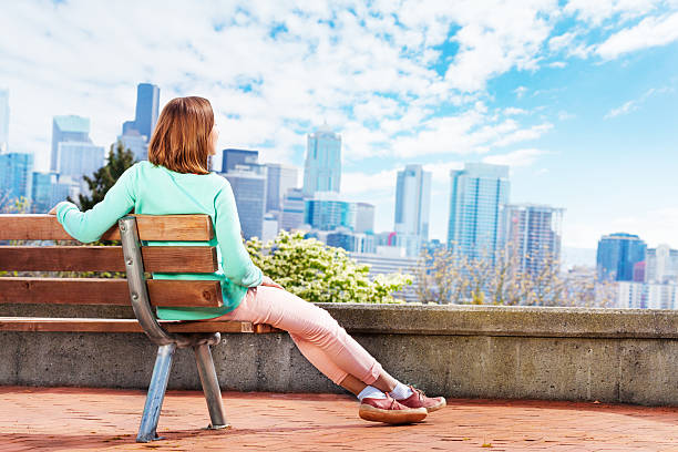 istock Young woman enjoy Seattle downtown view 506346024