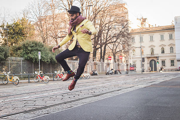 istock Indian handsome man jumping in the city streets 506349152