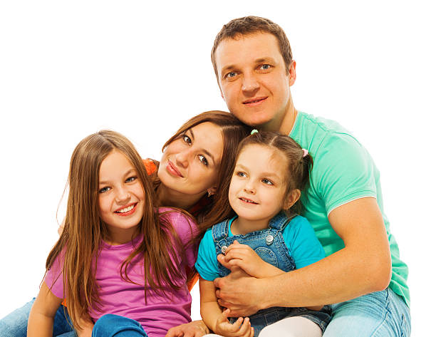 istock Parents with their pretty happy daughters 506351066