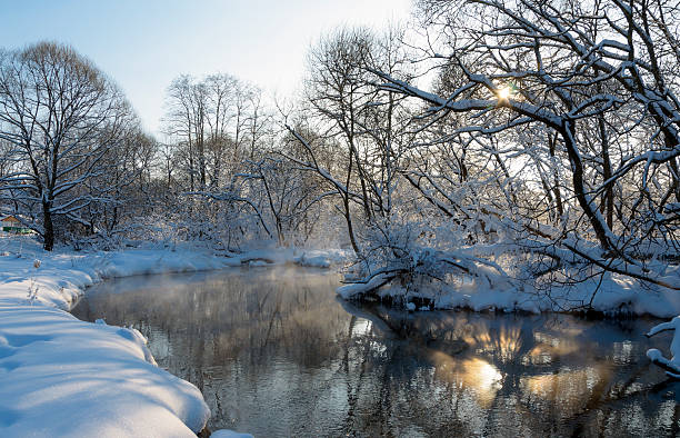 istock Sunny winter landscape with river 506351956