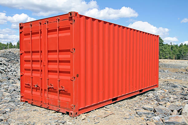 istock Red Shipping Container On Road Construction Site Used For Storage 506352362
