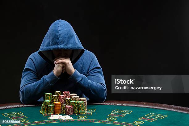 Poker Player Looking At Combination Of Two Aces Closeup Stock Photo - Download Image Now