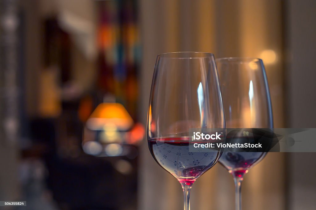 Pair of red wine glasses, closeup shot Closeup shot of two glasses of red wine Wine Stock Photo