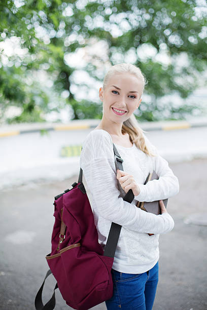 istock Teenage student with books 506359165