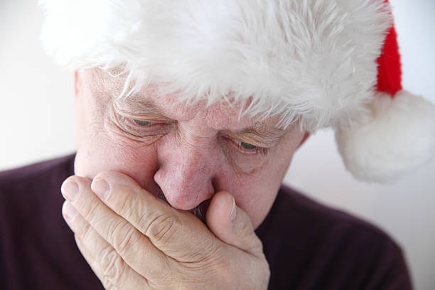 senior en Chapeau de Père Noël a Nausée - Photo