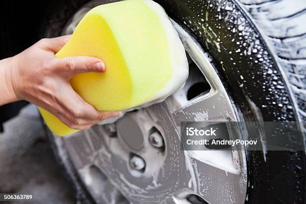 Hand Washing A Tire With Sponge Stock Photo - Download Image Now - Blue-collar Worker, Car, Clean