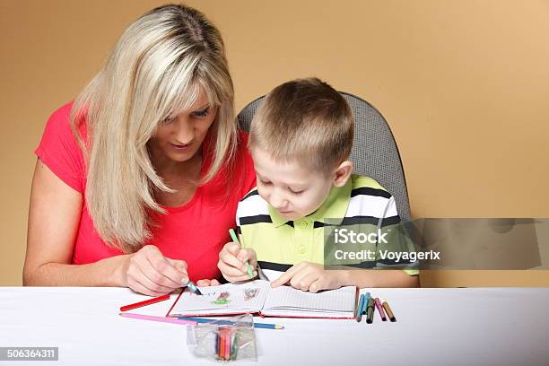 Mother And Son Drawing Together Stock Photo - Download Image Now - 6-7 Years, Activity, Adult