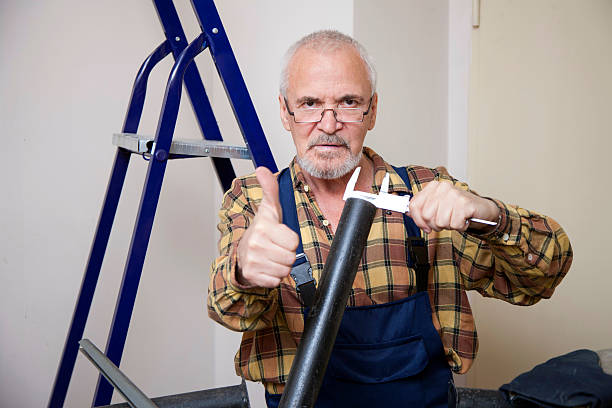 istock Engineer measures with tool the size of the pipe 506364675