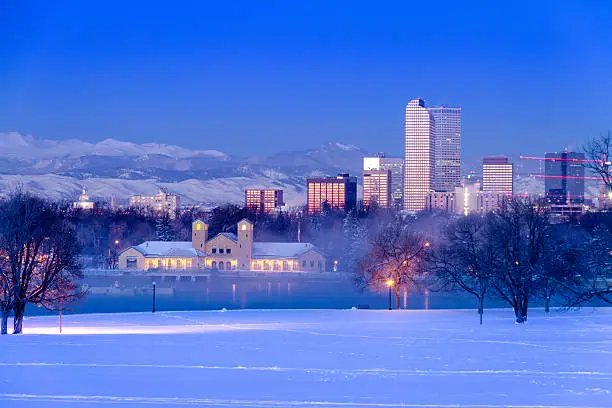 Denver Colorado skyline at sunrise, day after winter snow storm from City Park and Denver Museum of Science and Nature