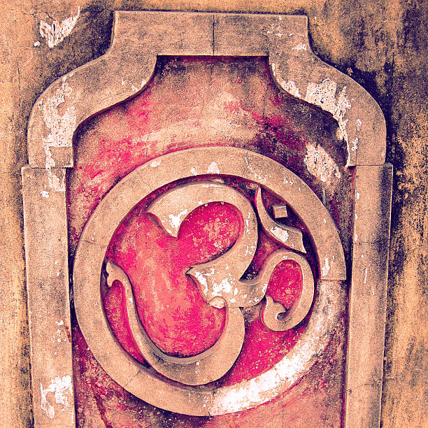 istock Ohm sign on a concrete wall background - vintage effect. 506365275