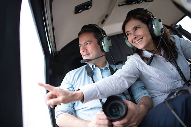 istock People traveling on a helicopter 506365573
