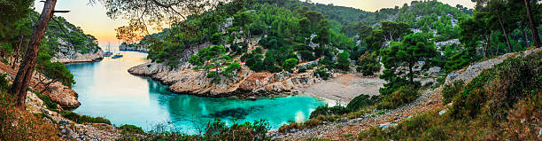 Turquoise bay during sunset - HDR panorama at Fench Riviera Seamlessly stitched HDR-panorama of a turquoise bay during sunset. Location: "Les Calanques de Cassis" at French Riviera close to Marseille. bouches du rhone photos stock pictures, royalty-free photos & images