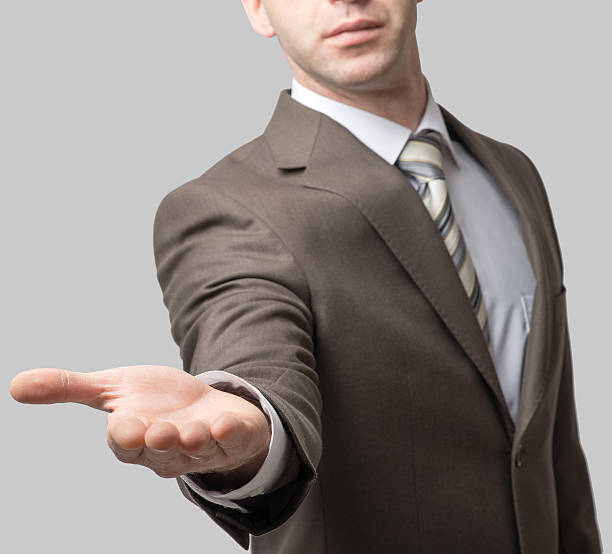 istock Businessman with outstretched hand 506389910