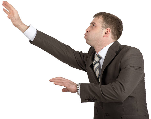 istock Businessman with inflated cheeks 506390028