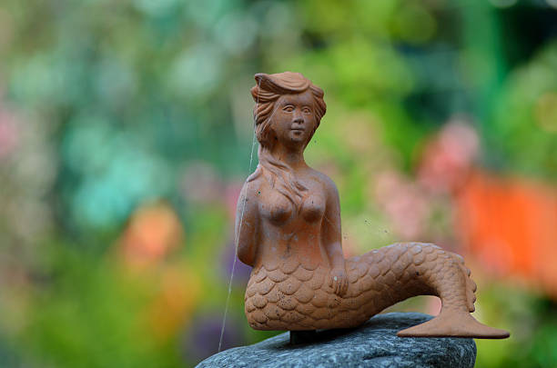 istock clay figure and colorful background 506390340