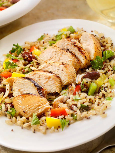 istock Grilled Chicken with Quinoa and Brown Rice Salad 506391294