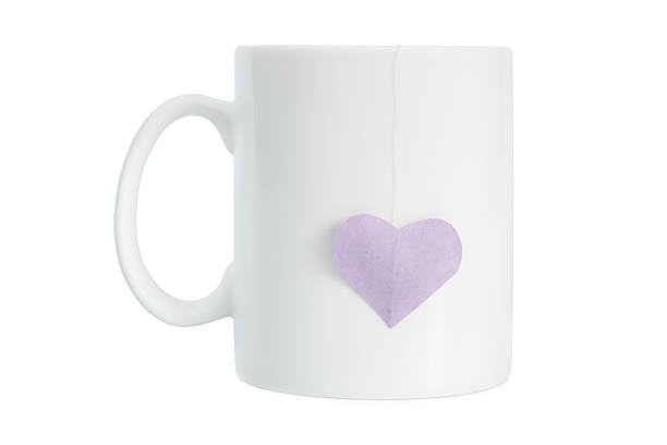istock Realistic classic white mug with heart shape label 506391612
