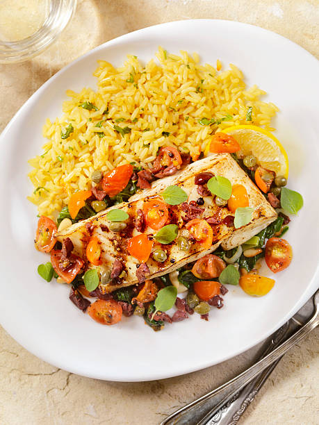 istock Grilled Halibut with Capers,Olives and Tomatoes 506391642