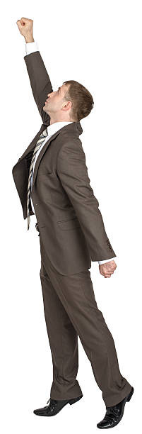 istock Businessman with arm up 506392088