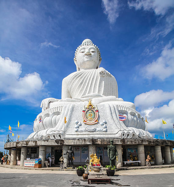 Phuket, Thailandy - December 9, 2015: Wide angle view of the Big Buddha on Phuket in Thailand. The statue is about 45 m high and is still not completed yet. Tourists can buy tiles and stones for complete the construction.