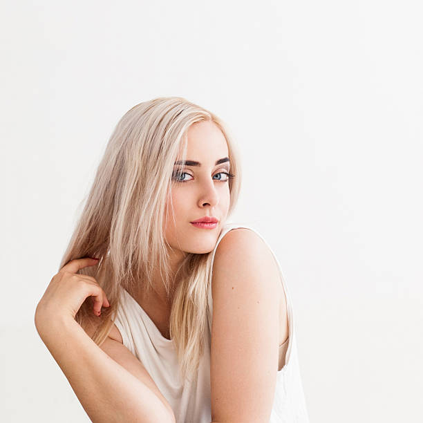 istock girl with blond dyed hair 506393720
