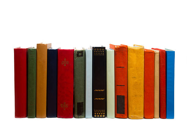 istock Stack of books at wooden shelf isolated on white background 506394896