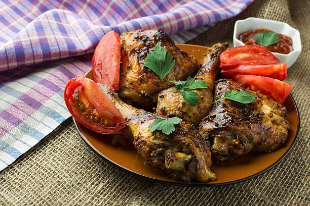 istock Roasted chicken wings and legs 506395322