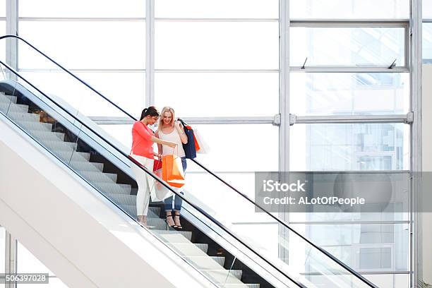 Women In Shopping Mall Stock Photo - Download Image Now - Escalator, Shopping Mall, Retail