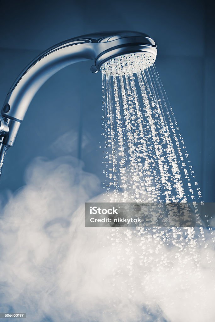 contrast shower contrast shower with water stream, blue tonning Shower Stock Photo