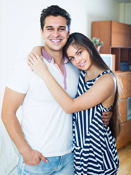 istock Girlfriend and boyfriend cuddling 506401328