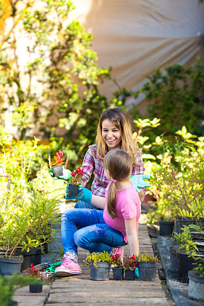 istock Mother and daughter in garden. 506401505