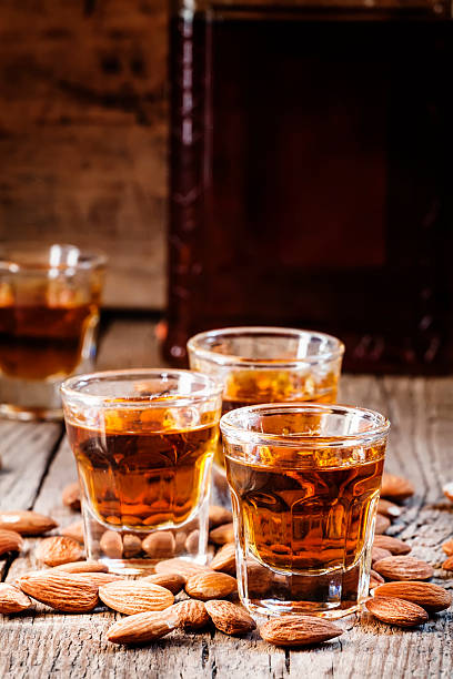istock Italian amaretto liqueur with dry almonds 506401902