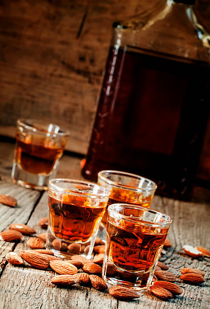 istock Italian amaretto liqueur with dry almonds 506402072