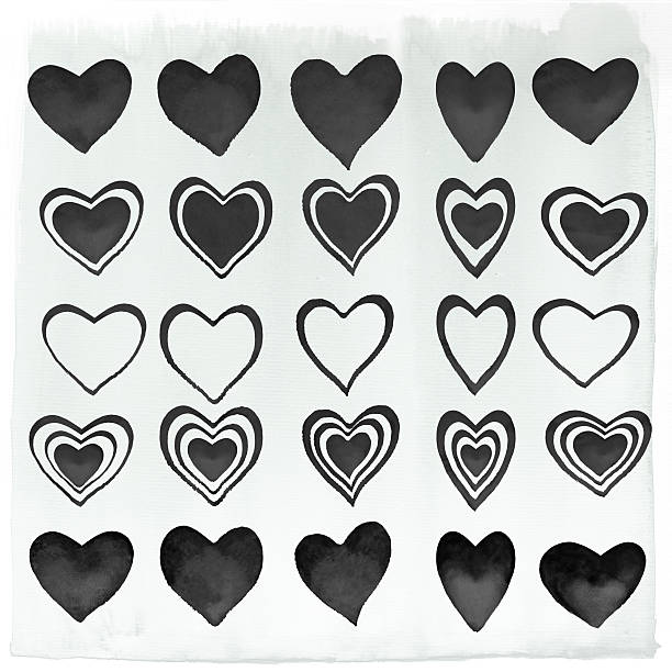istock Hand painted set of black hearts on a white paper 506402242