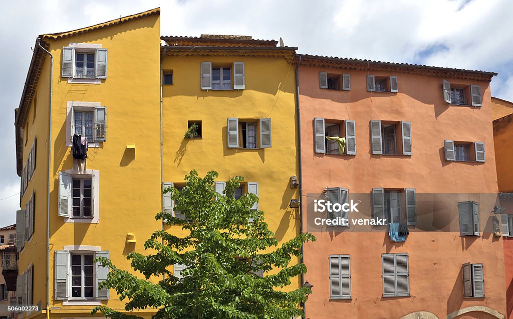 Grasse - Architecture of Grasse Town Architecture of Grasse Town in the southern France. It is a city in the French department of Alpes-Maritimes. Grasse is famous for its perfume industry. The city was founded in the XI century. Grasse Stock Photo