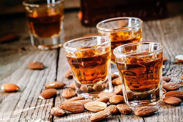 istock Italian amaretto liqueur with dry almonds 506402362