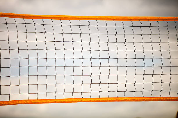 istock Volleyball summer sport. Net on a sandy beach 506402907