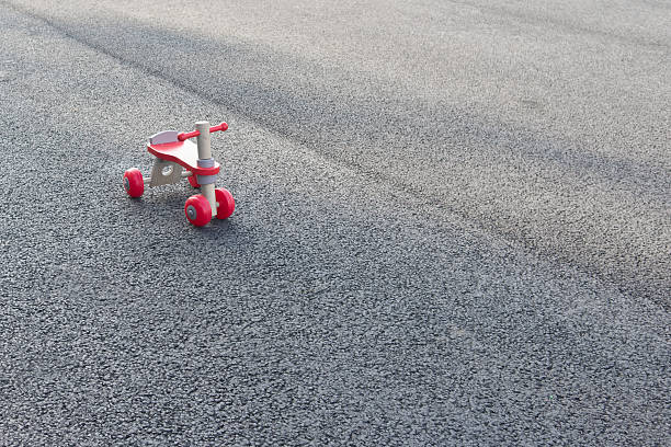 istock Wooden tricycle on the pavement 506404466