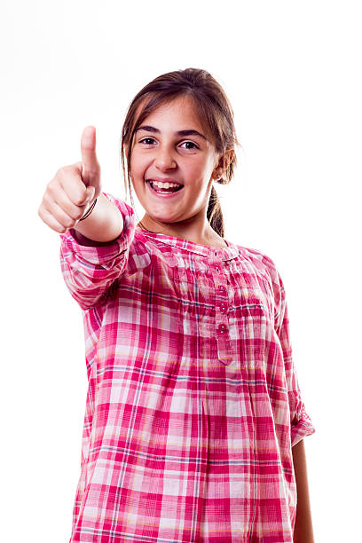 istock little girl with thumbs up 506428559