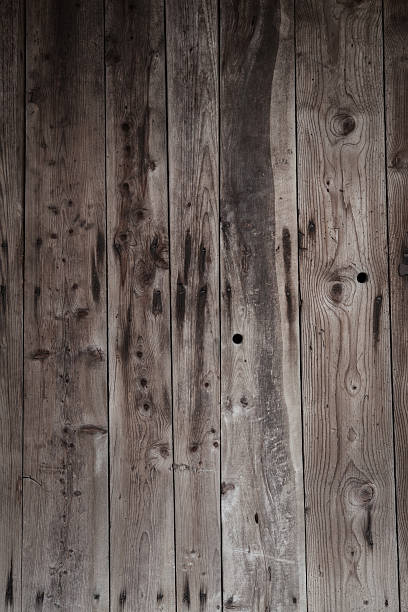 istock dark wood planks 506429223