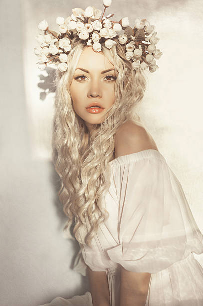 Beautiful blonde with wreath of flowers Fashion-art portrait of romantic blonde with wreath of flowers fairy rose stock pictures, royalty-free photos & images