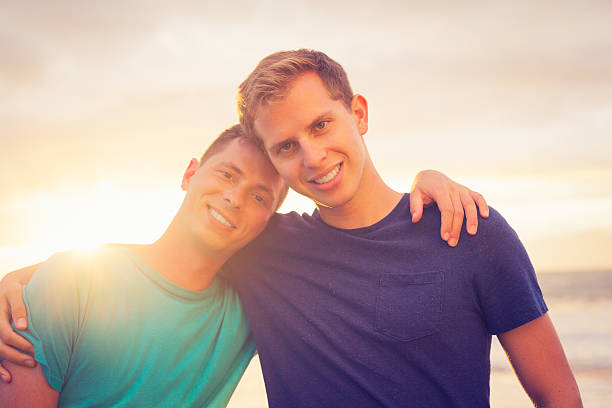 istock Gay couple watching sunset 506430425