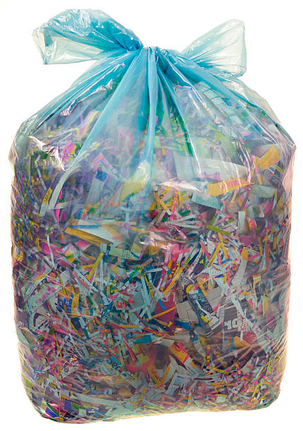 Transparent Plastic Bag with Paper Shreddings stock photo