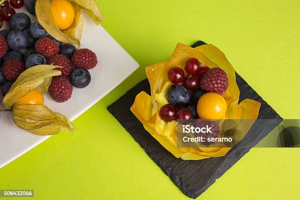 Mini Cheesecake With Filo Pastry And Berries Stock Photo - Download Image Now - Baked, Baked Pastry Item, Berry Fruit
