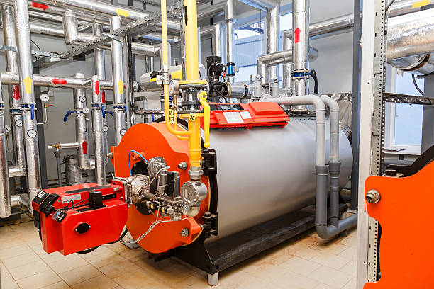 large industrial boiler room stock photo