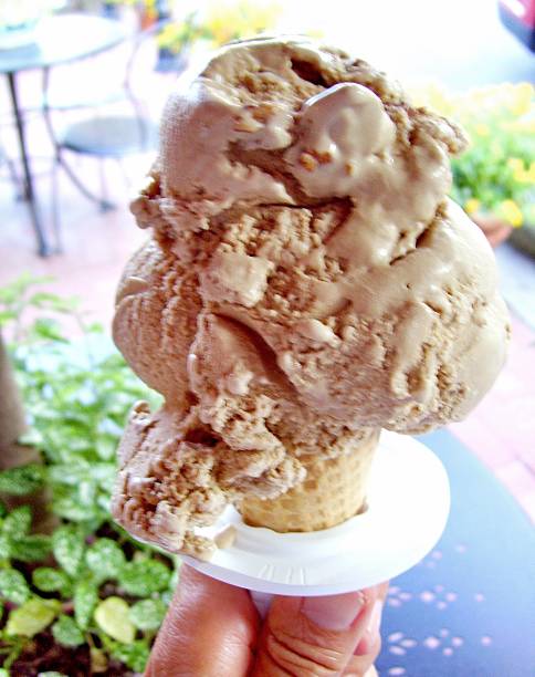 istock Tasty Praline Ice Cream in a Cone 506433153