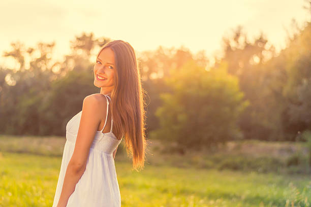istock Beautiful young woman in nature 506433507