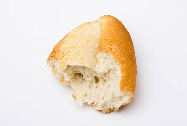 istock High angle view of white bread on white background 506434098